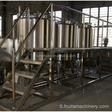 Bottled fruit juice processing at packaging line